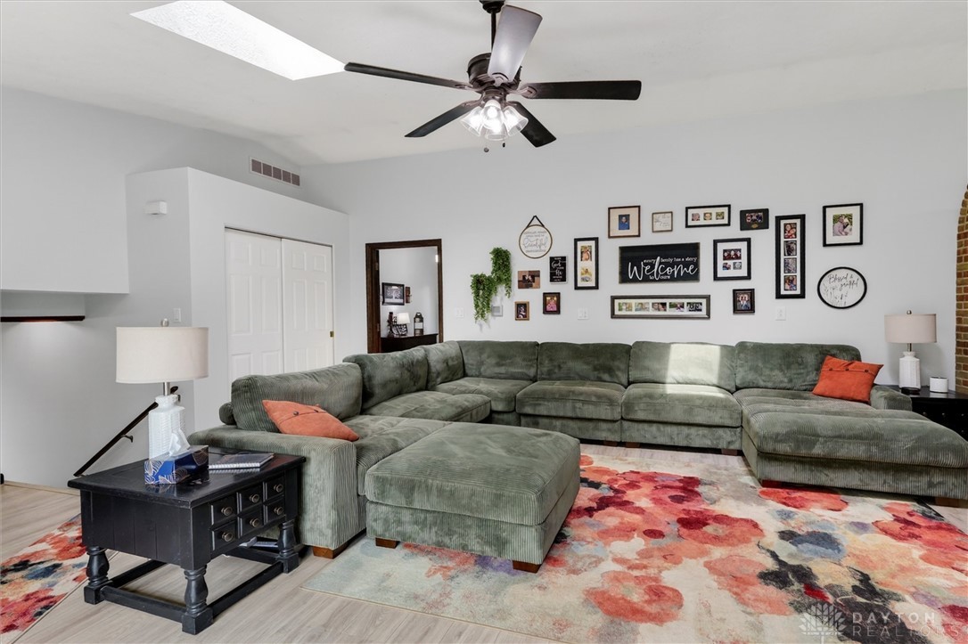 2165 Stewart Road Xenia, OH 45385 - Photo 16 of 59 This inviting living area boasts comfort and natural light, perfect for relaxed gatherings.