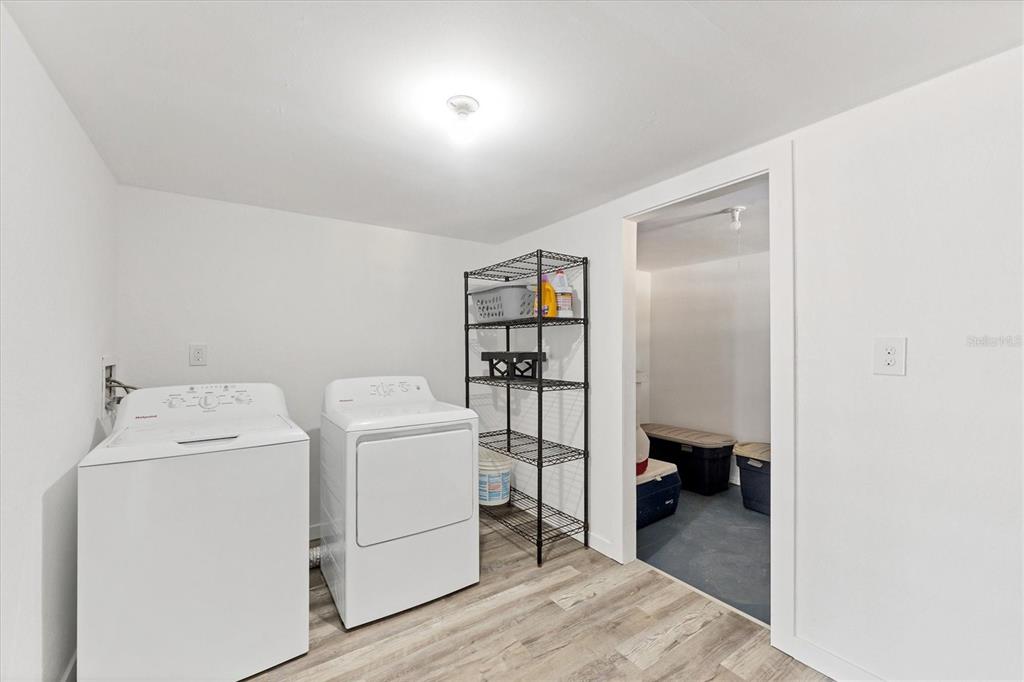 331 Bocilla Drive Boca Grande, FL 33921 - Photo 24 of 34 a utility room with dryer and washer