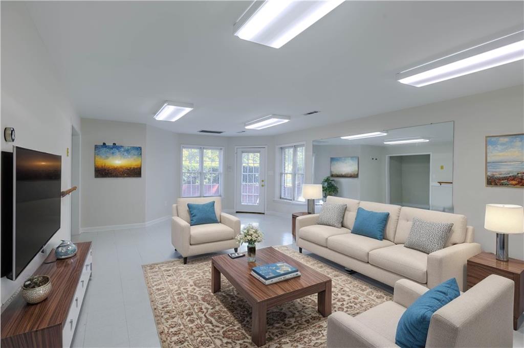 48 Fox Croft Road Rome, GA 30165 - Photo 13 of 69 a living room with furniture and a flat screen tv