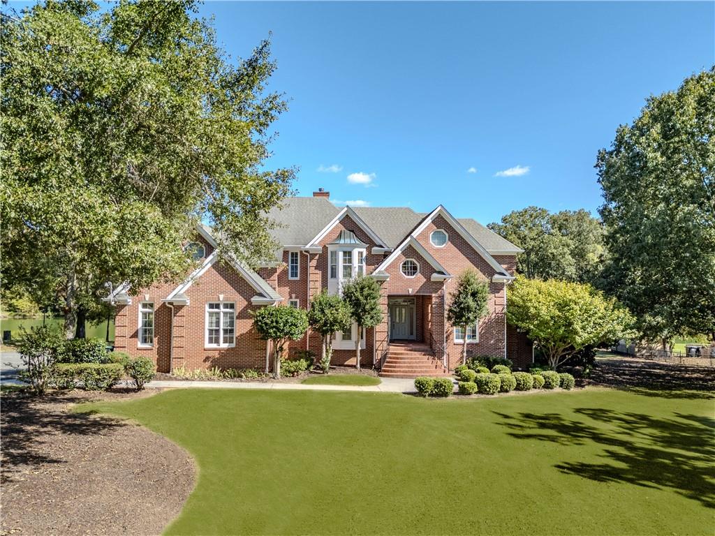 48 Fox Croft Road Rome, GA 30165 - Photo 15 of 69 a front view of a house with a garden and porch