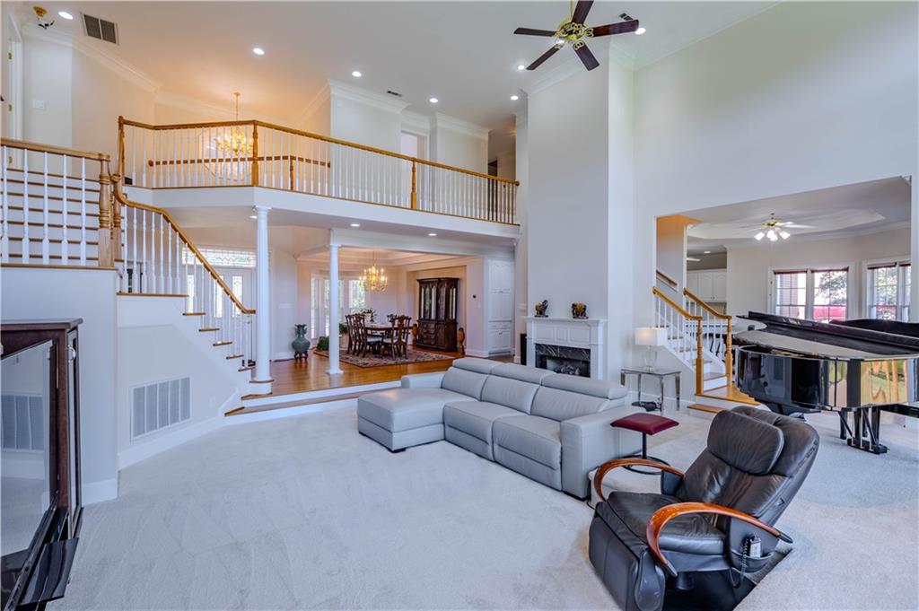 48 Fox Croft Road Rome, GA 30165 - Photo 22 of 69 a living room with furniture and a chandelier