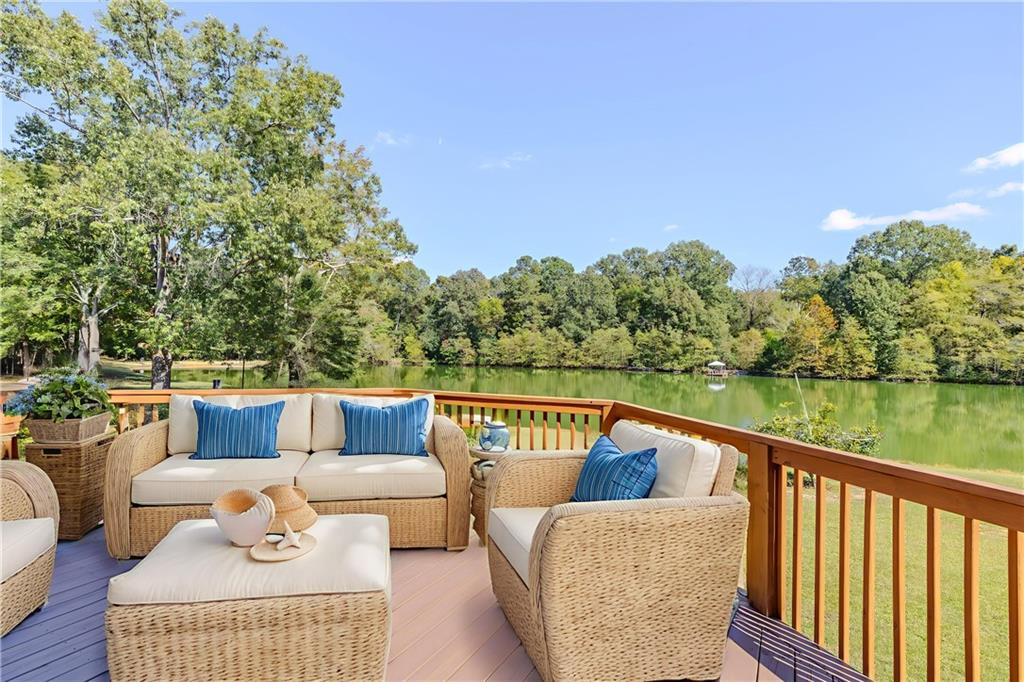 48 Fox Croft Road Rome, GA 30165 - Photo 3 of 69 a balcony with wooden floor and outdoor seating