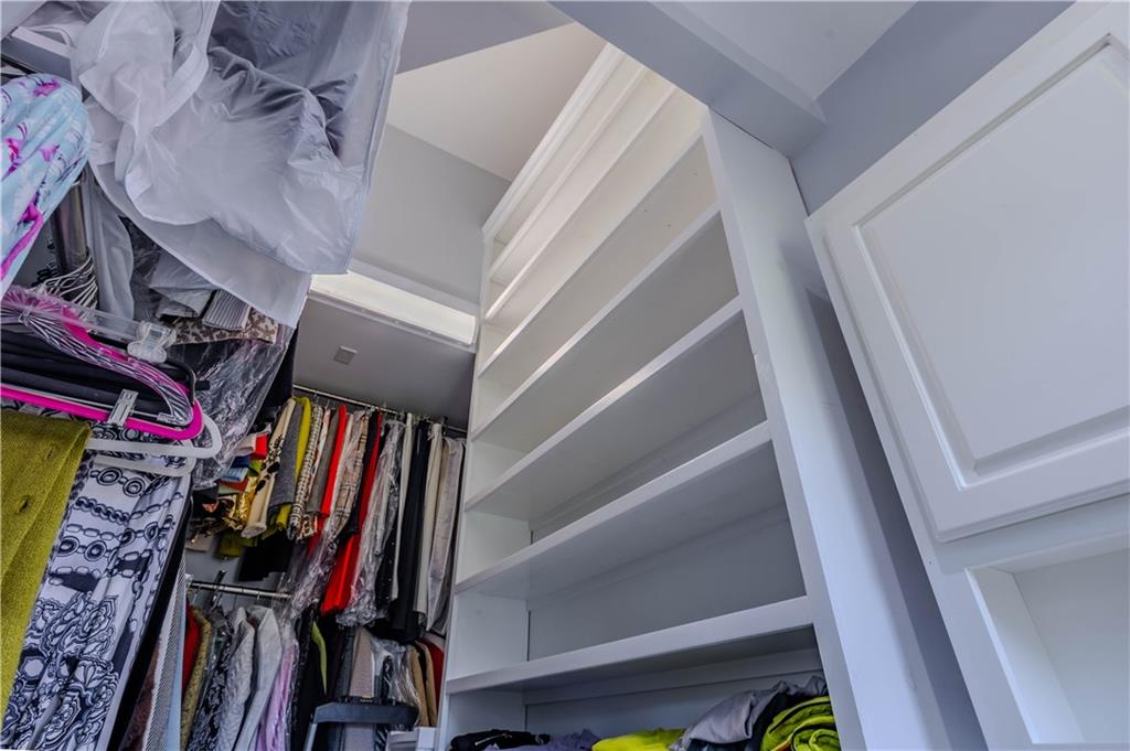48 Fox Croft Road Rome, GA 30165 - Photo 41 of 69 a view of walk in closet with clothes and shoes