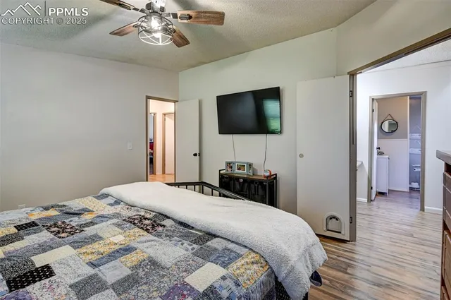 a bathroom with a sink a toilet and shower curtain