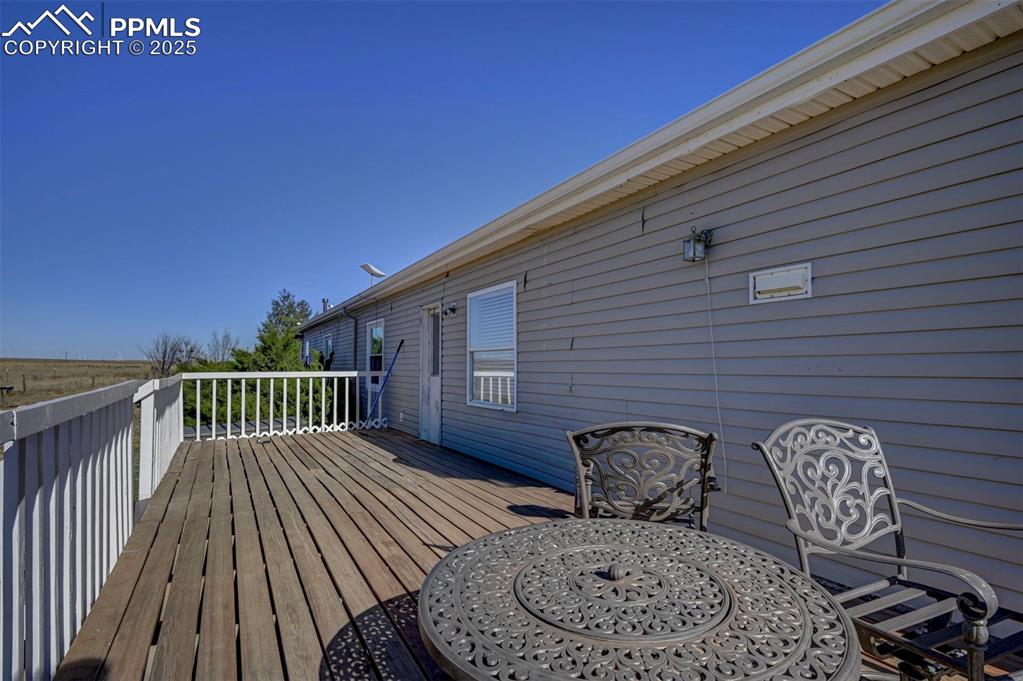 35355 Funk Road Calhan, CO 80808 - Photo 30 of 31 a view of balcony with wooden floor