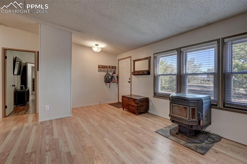 35355 Funk Road Calhan, CO 80808 - Photo 7 of 31 wooden floor and windows in a room