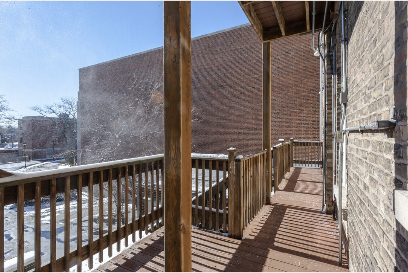 293 East Deerpath Road, Unit 22 Lake Forest, IL 60045 - Photo 13 of 13 a view of a balcony with wooden floor
