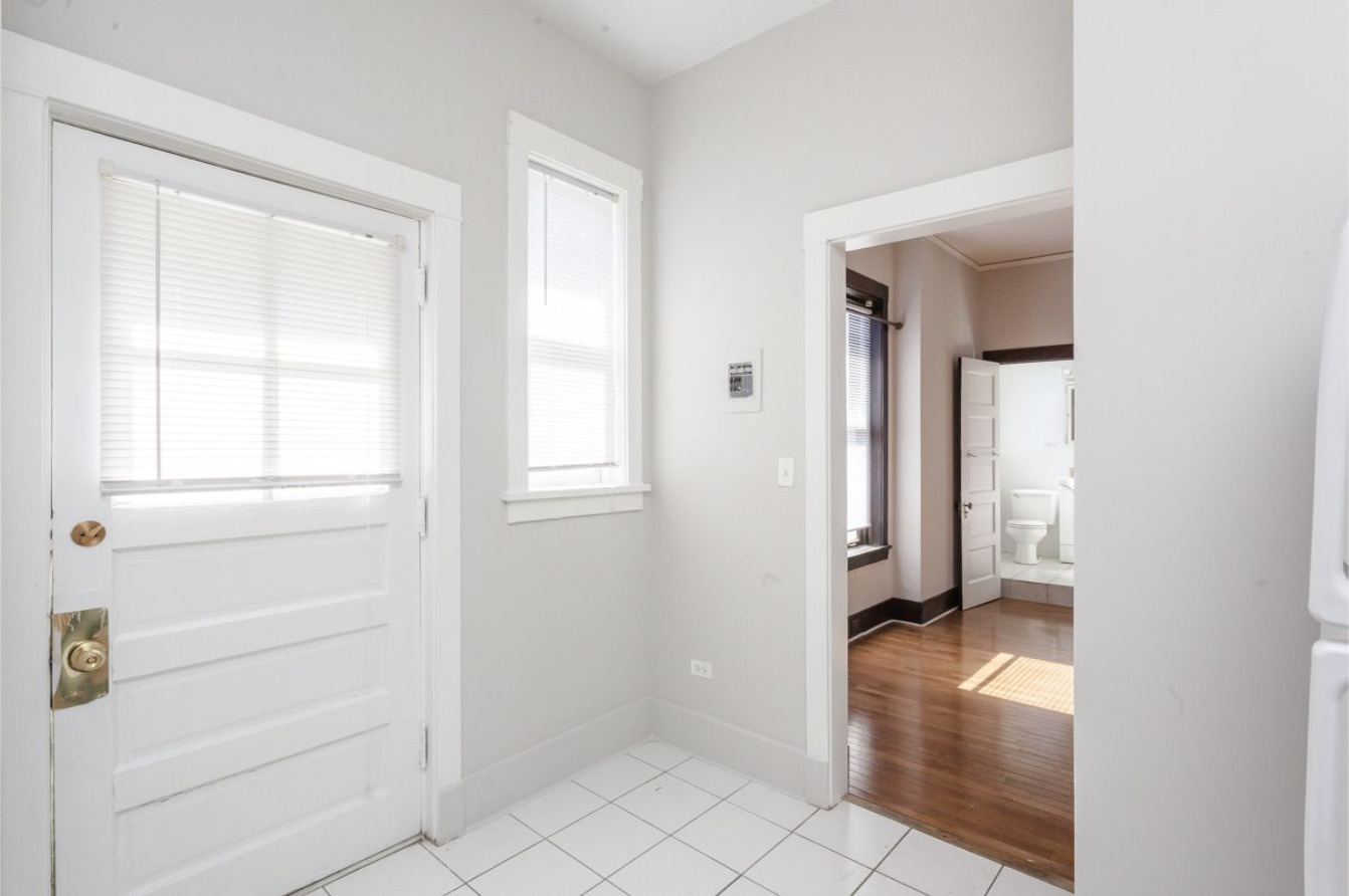 293 East Deerpath Road, Unit 22 Lake Forest, IL 60045 - Photo 10 of 13 a view of an entryway with wooden floor