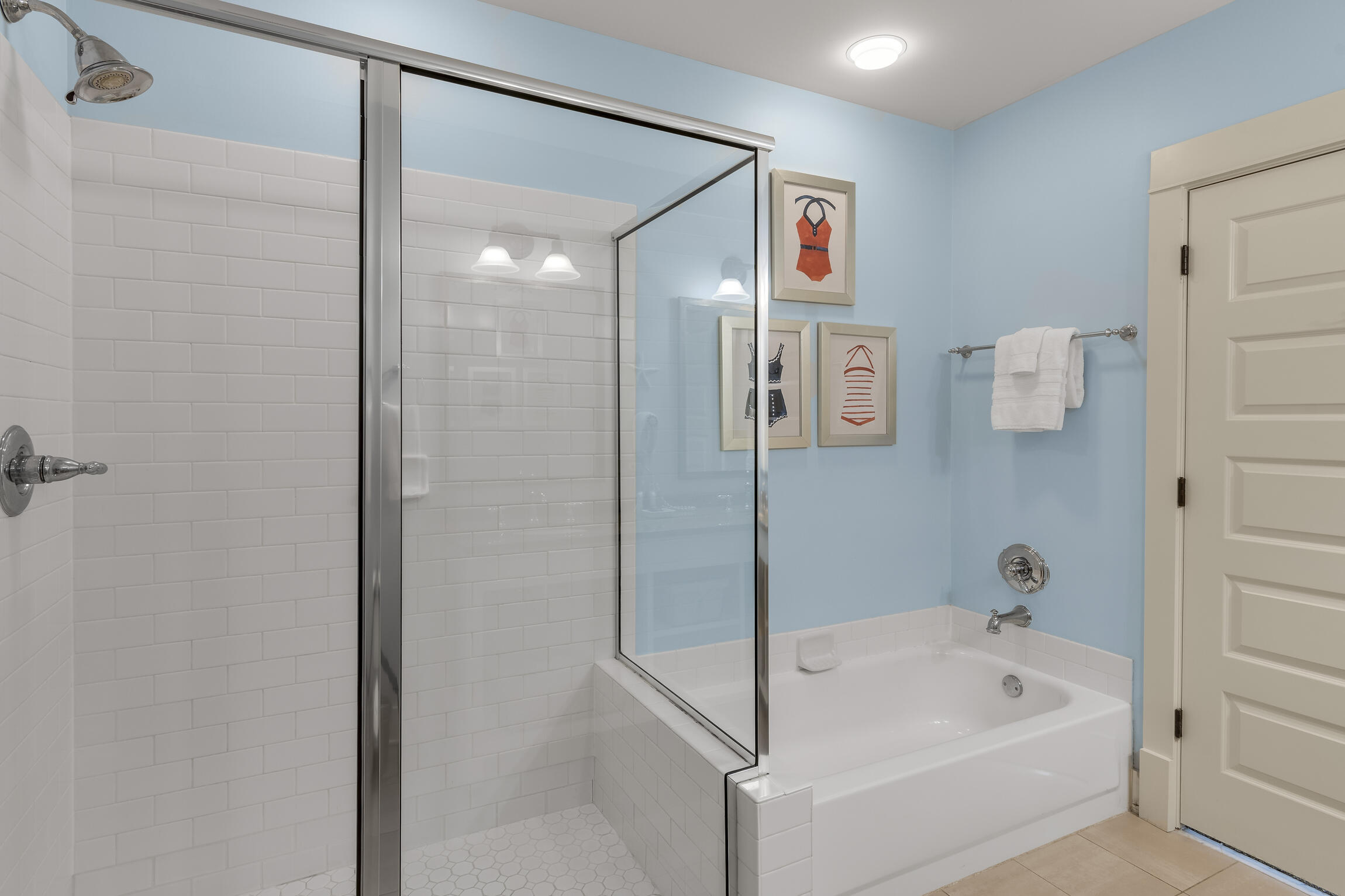 2050 West County Highway 30A, Unit M1219 Santa Rosa Beach, FL 32459 - Photo 14 of 47 a bathroom with a tub shower sink and mirror