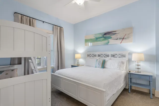 a bedroom with a bed and a cabinets