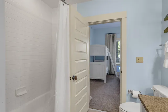 a bathroom with a sink and toilet