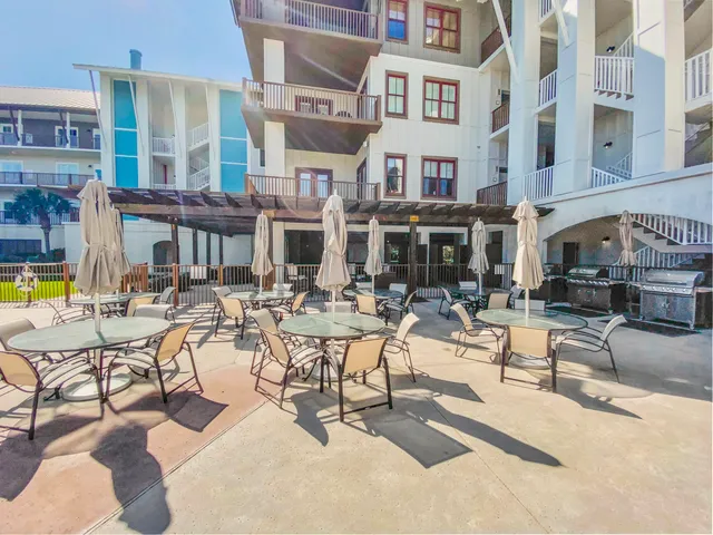 a view of a yard with palm trees