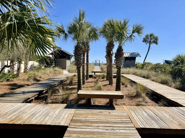 a view of a back yard from a balcony