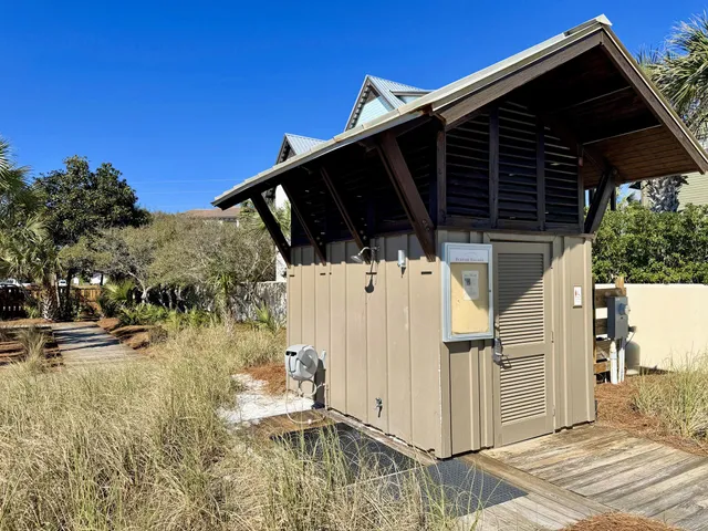 a view of a garden with an ocean view