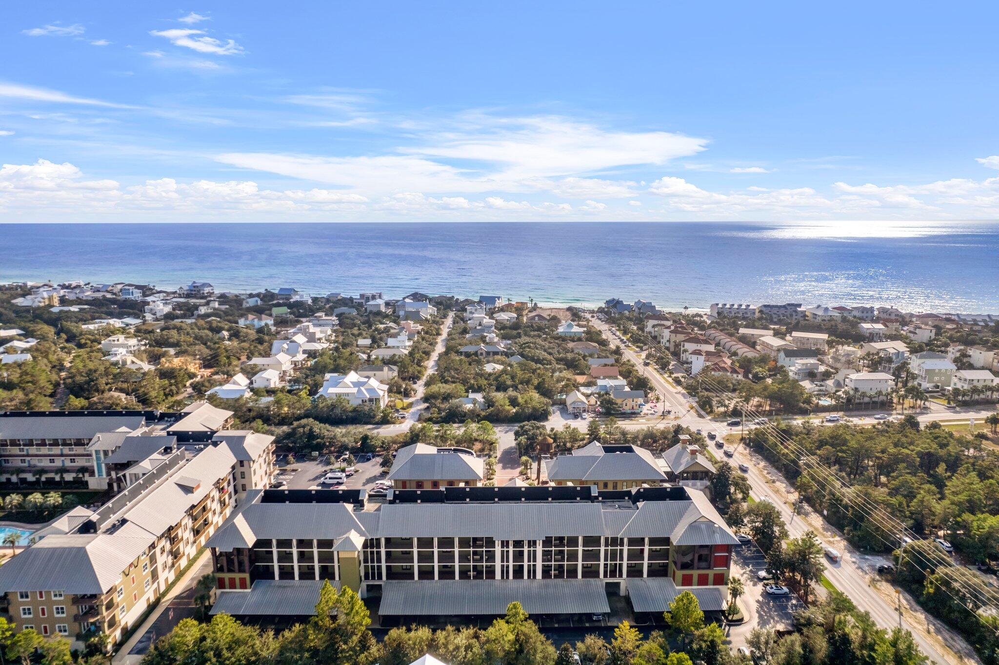 2050 West County Highway 30A, Unit M1219 Santa Rosa Beach, FL 32459 - Photo 41 of 47 an aerial view of residential houses with city view