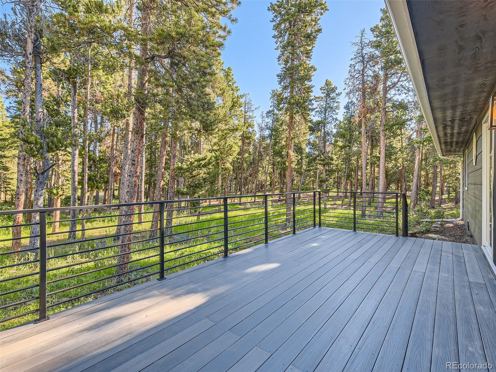 161 Gap Road Black Hawk, CO 80422 - Photo 19 of 28 a view of a yard with wooden fence
