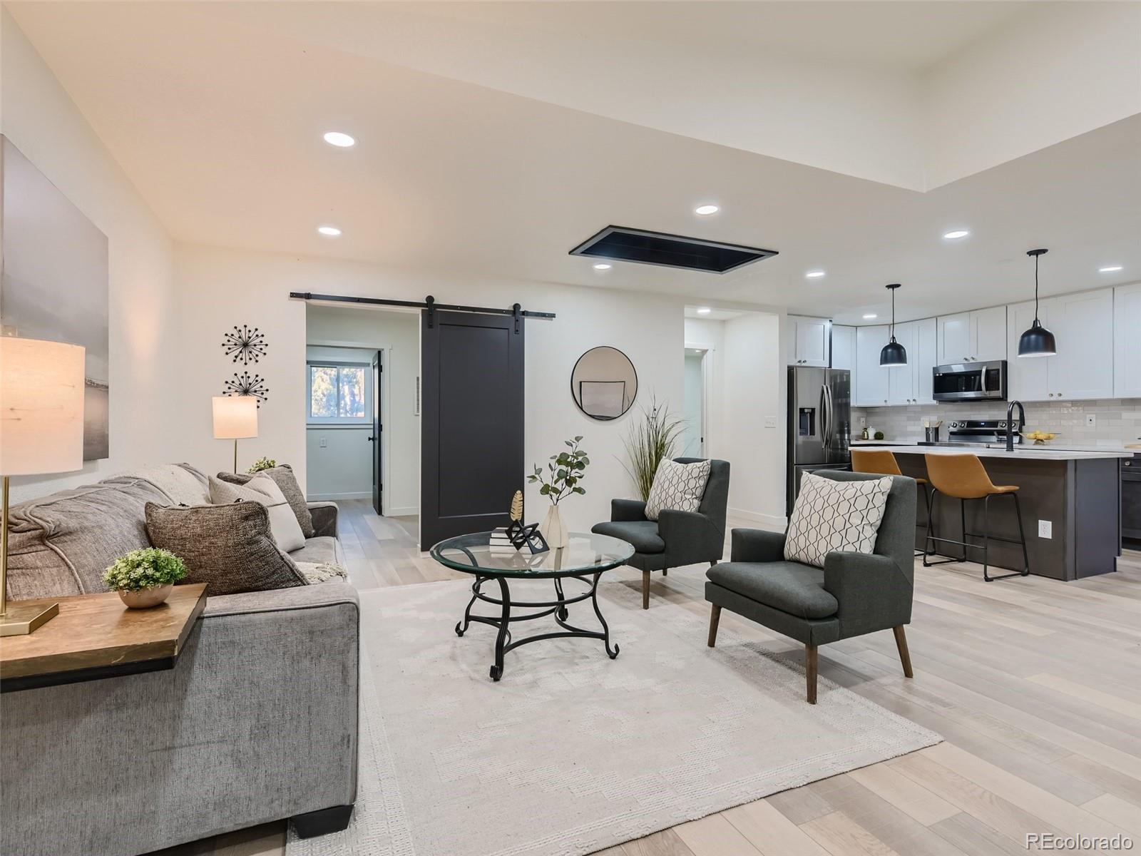 161 Gap Road Black Hawk, CO 80422 - Photo 23 of 28 a living room with furniture and kitchen view