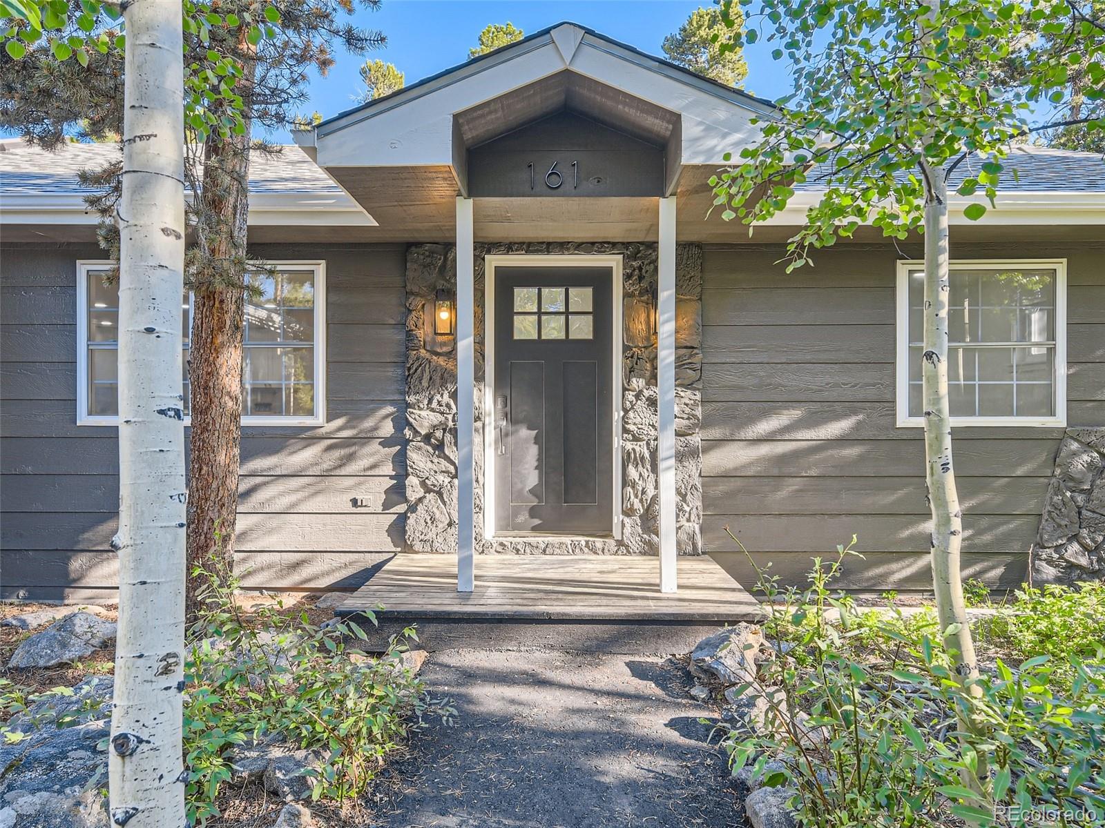 161 Gap Road Black Hawk, CO 80422 - Photo 4 of 28 front view of a house with a small yard