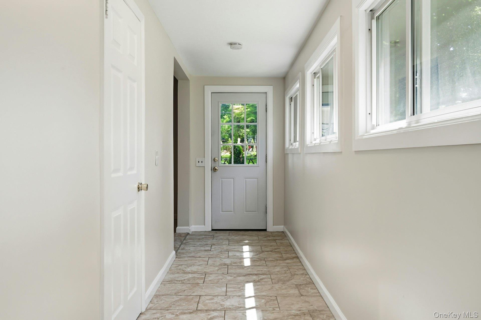 12 Chester Street Locust Valley, NY 11560 - Photo 20 of 31 First floor hallway