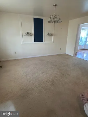 a view of a room with an empty space
