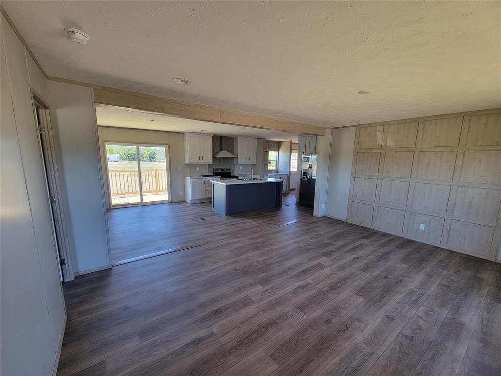 387 Duvall Street Bonham, TX 75418 - Photo 12 of 24 a view of living room with furniture and wooden floor