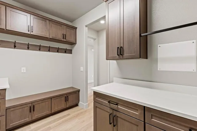 a view of a kitchen with electric appliances