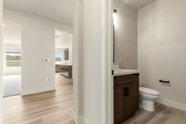 a bathroom with a toilet and a sink