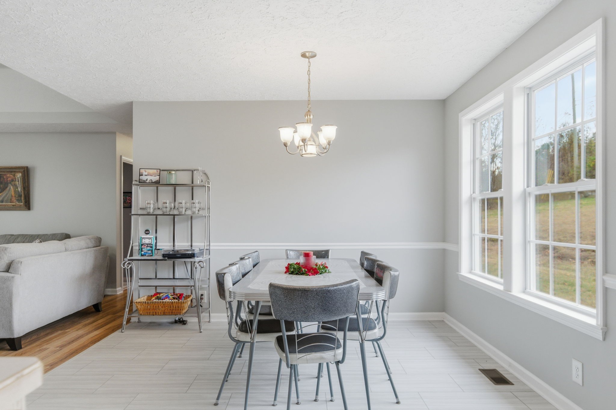742 Bowling Branch Road Cottontown, TN 37048 - Photo 17 of 42 a outdoor dining room with furniture a chandelier and a window