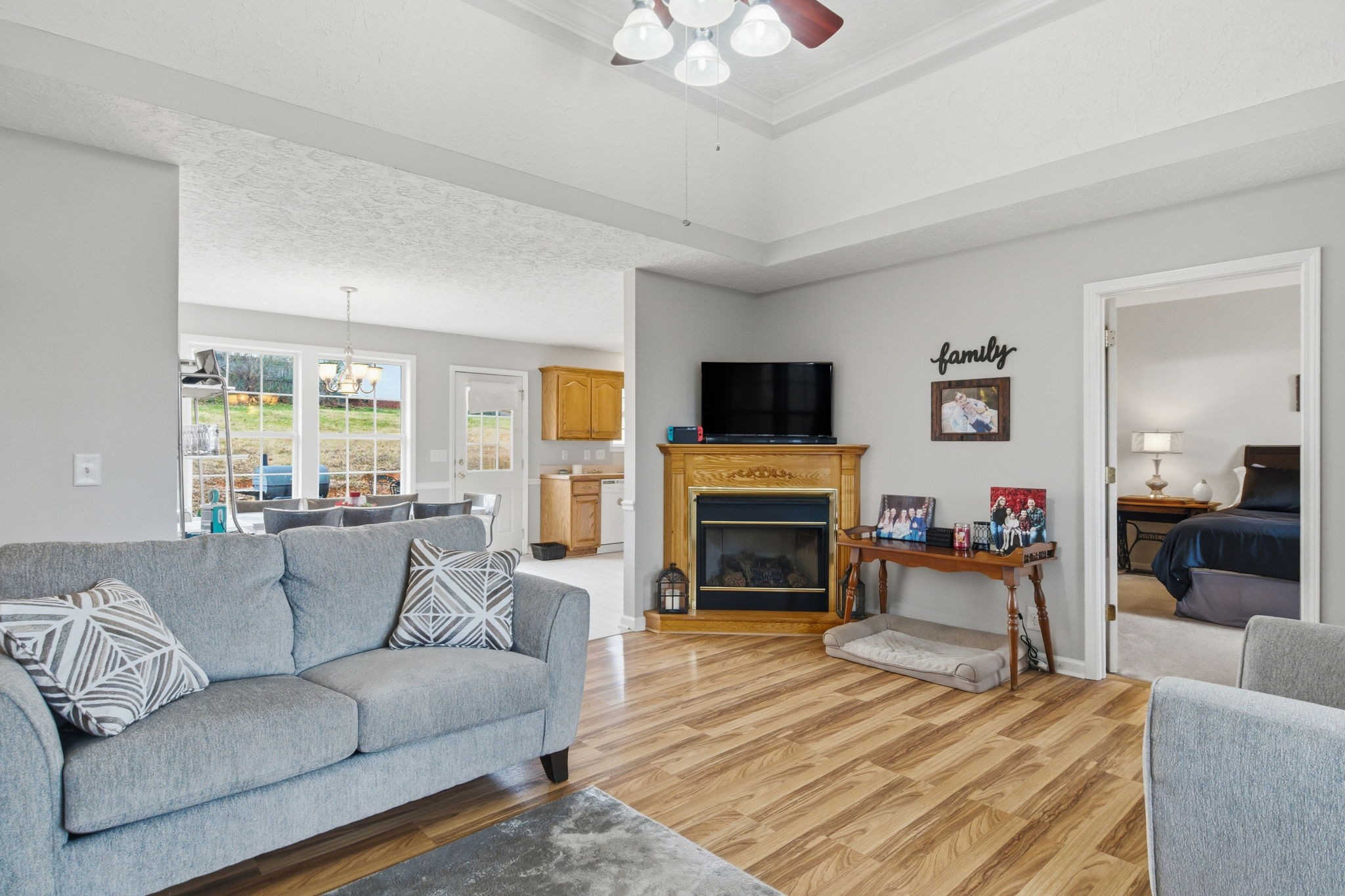 742 Bowling Branch Road Cottontown, TN 37048 - Photo 20 of 42 a living room with furniture and a fireplace