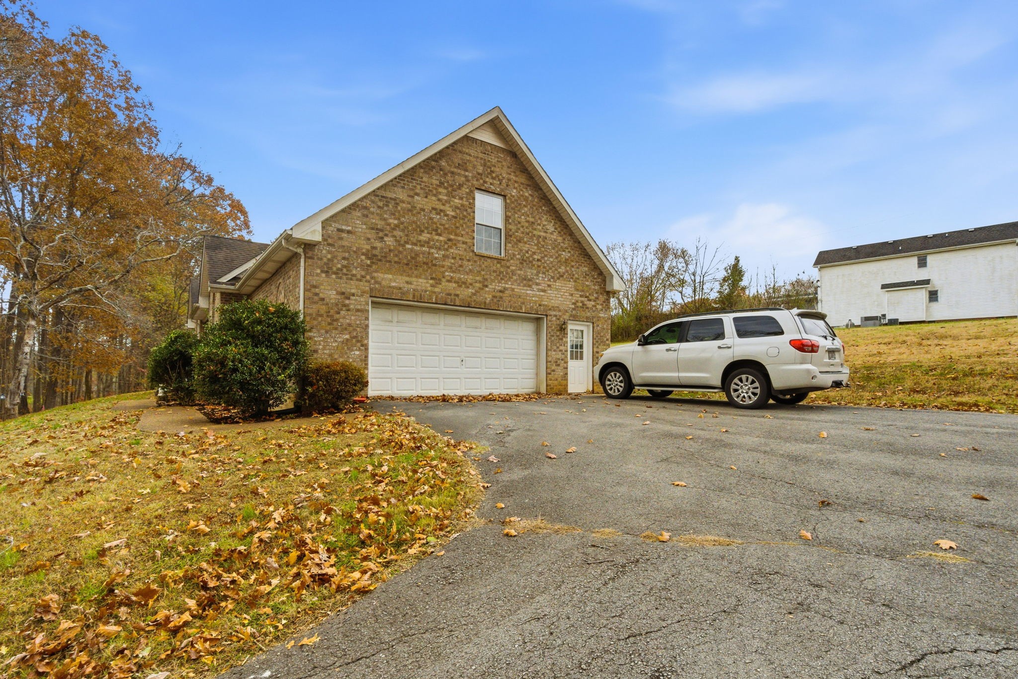742 Bowling Branch Road Cottontown, TN 37048 - Photo 37 of 42 a front view of a house with cars parked