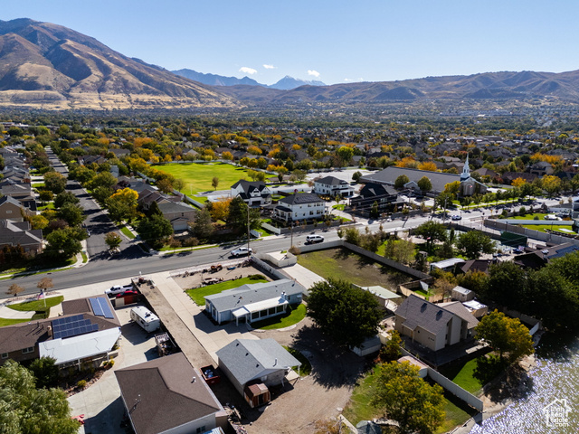 12958 South 300 East Draper, UT 84020 - Photo 17 of 38 Aerial perspective of suburban area with a mountain backdrop