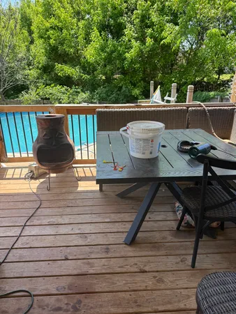 a view of a swimming pool with an outdoor space