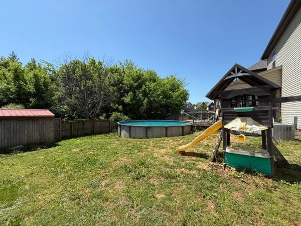 a front view of a house with swimming pool