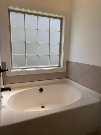a bathroom with a bathtub