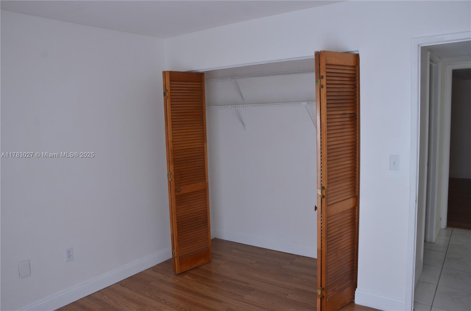 8850 Southwest 123rd Court, Unit H302 Miami, FL 33186 - Photo 16 of 28 a view of closet area