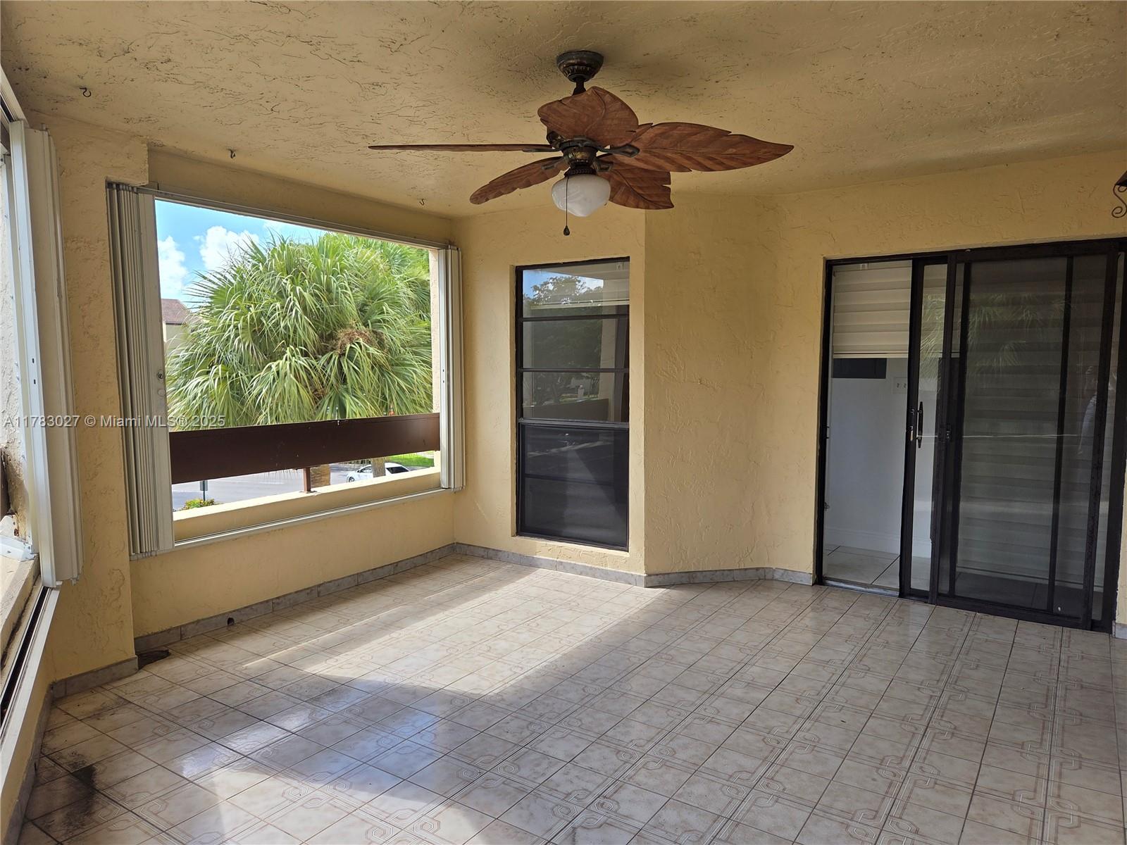 8850 Southwest 123rd Court, Unit H302 Miami, FL 33186 - Photo 20 of 28 a view of livingroom with window
