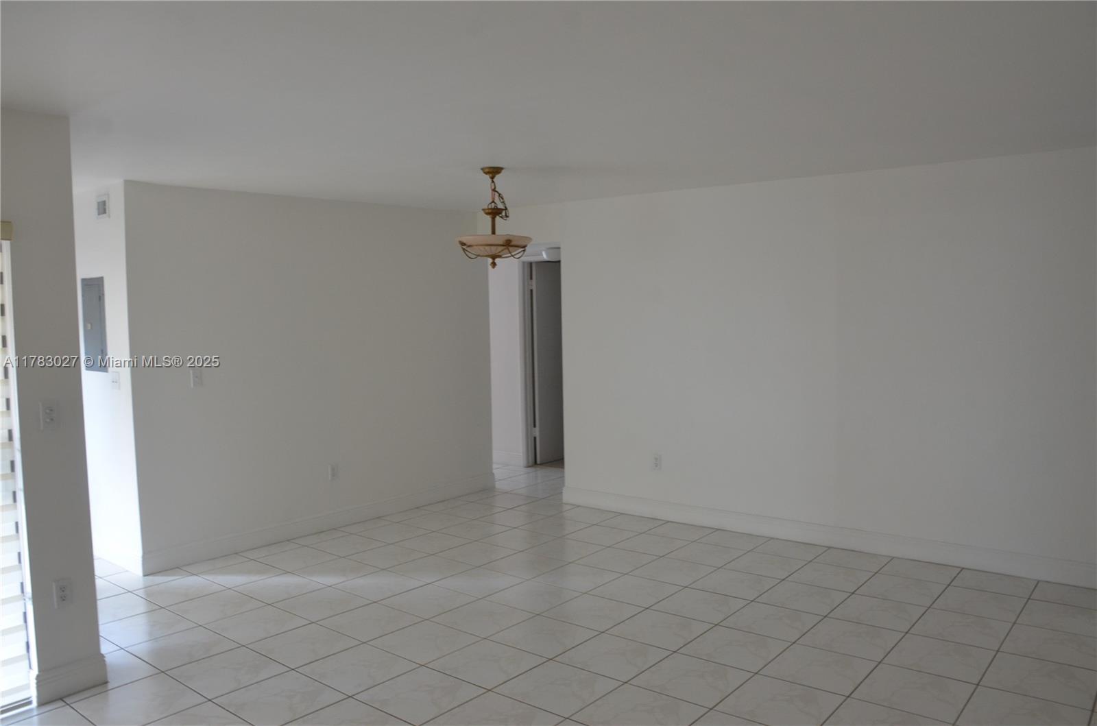 8850 Southwest 123rd Court, Unit H302 Miami, FL 33186 - Photo 5 of 28 an empty room with a empty space