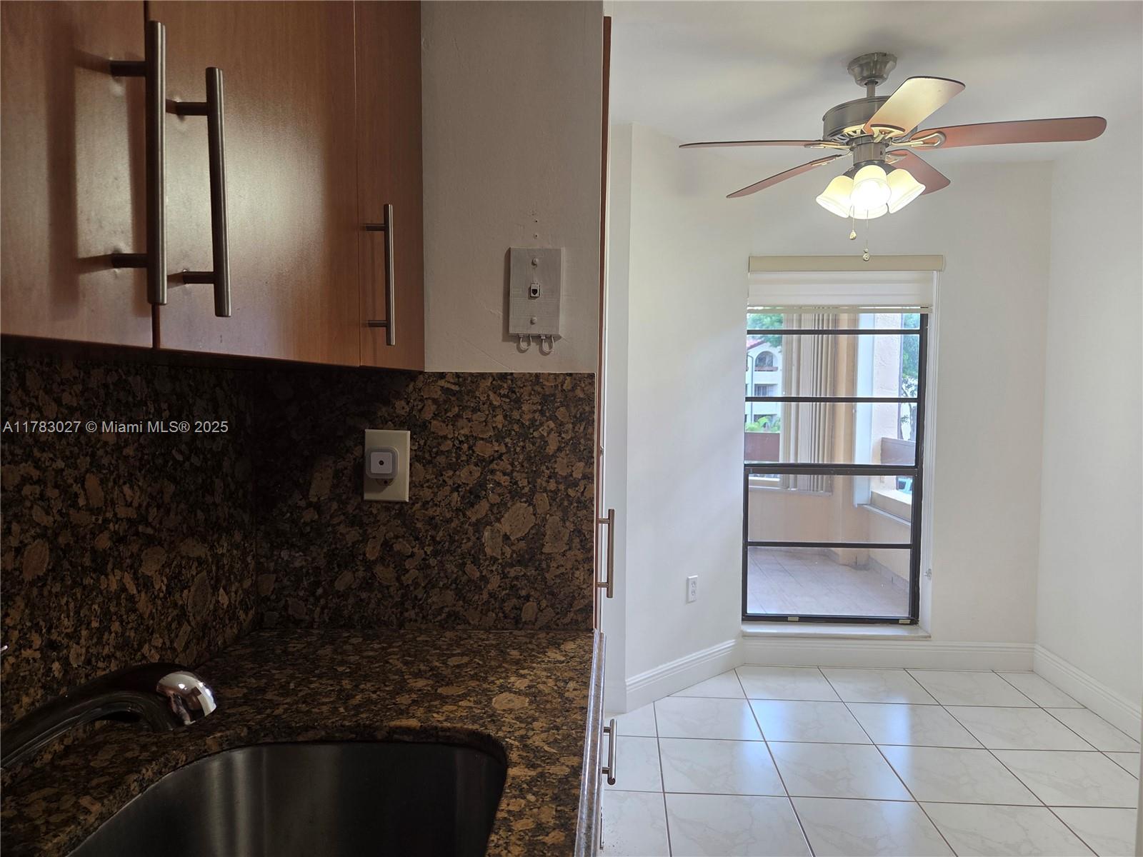 8850 Southwest 123rd Court, Unit H302 Miami, FL 33186 - Photo 8 of 28 a bathroom with a bathtub
