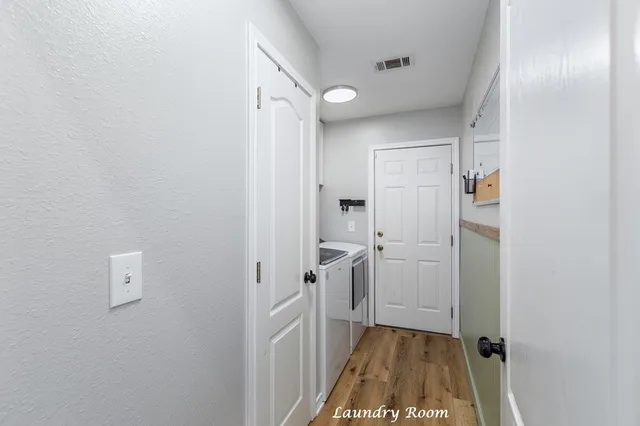 a bathroom with a sink and shower