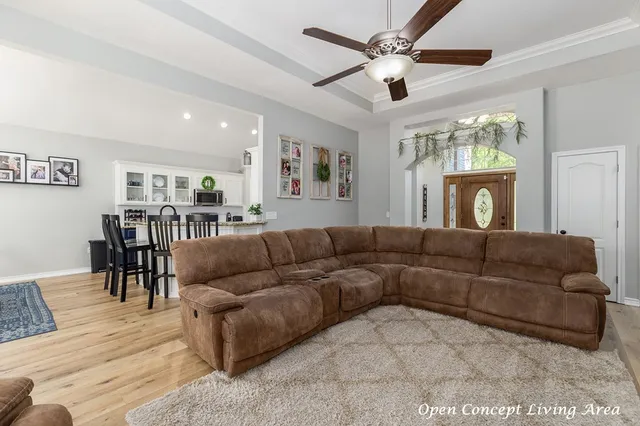 a living room with furniture and a window
