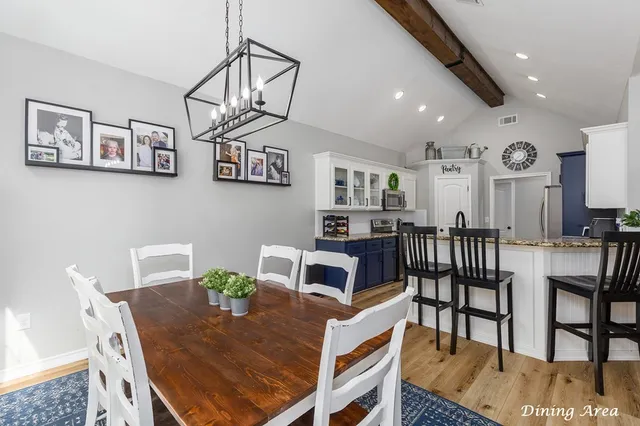 a view of a dining room with furniture