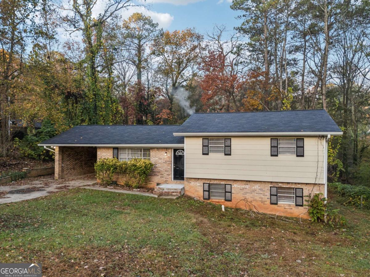 front view of a house with a yard