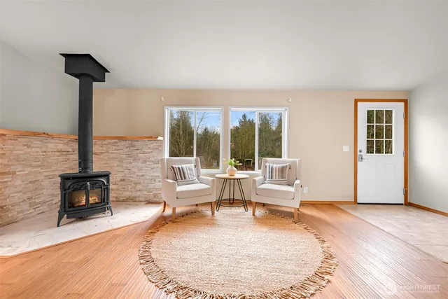 a living room with furniture and a table