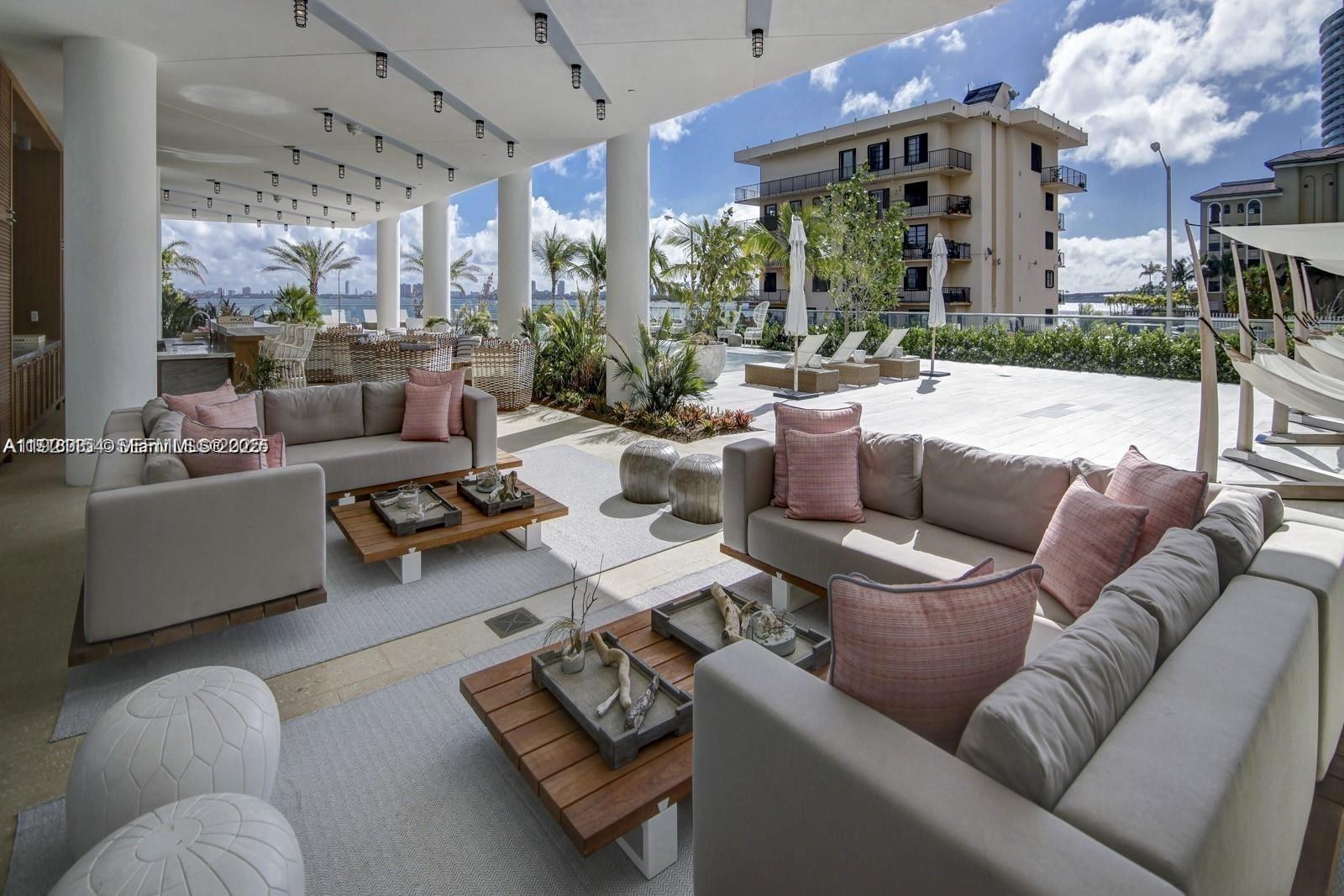 2900 Northeast 7th Avenue, Unit 5002 Miami, FL 33137 - Photo 19 of 24 a living room with furniture and a large window