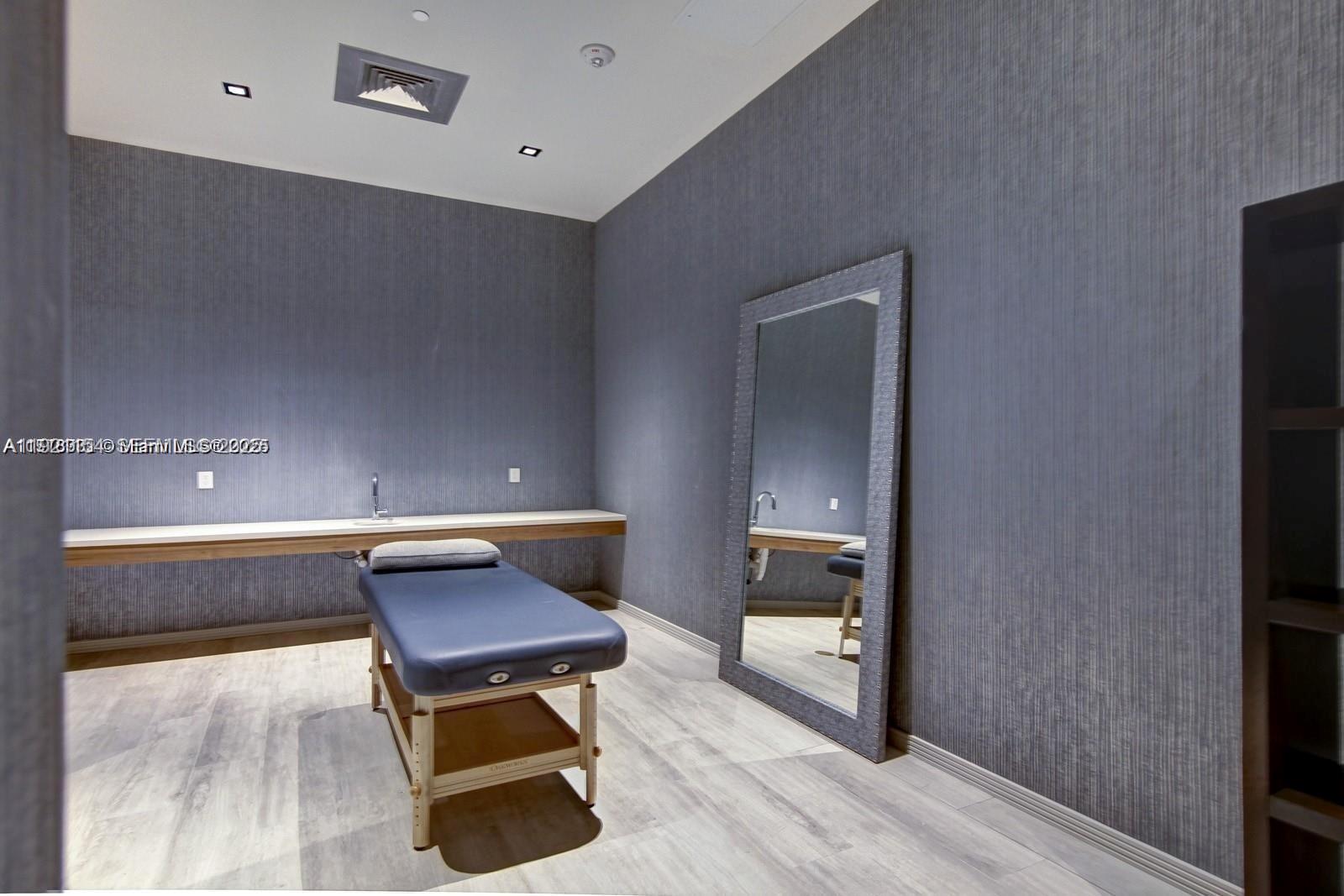 2900 Northeast 7th Avenue, Unit 5002 Miami, FL 33137 - Photo 22 of 24 a room with furniture and a potted plant