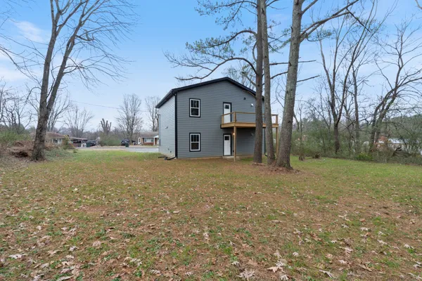 a house view with a backyard space
