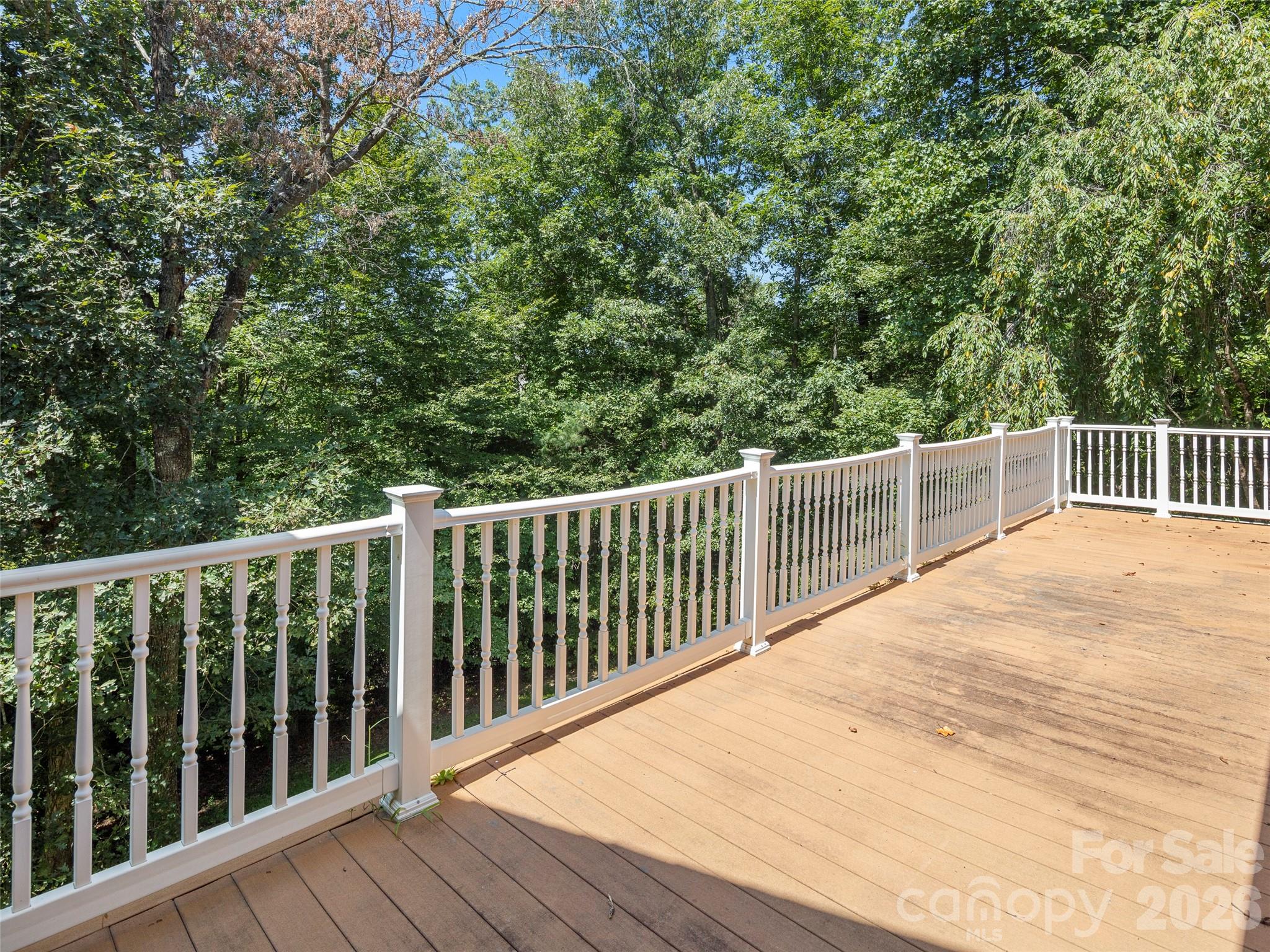4901 Brevard Road Horse Shoe, NC 28742 - Photo 13 of 34 a balcony with wooden floor and fence
