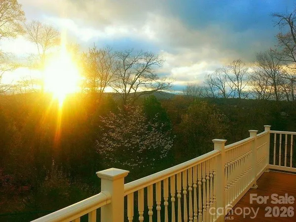 a view of a lake from a balcony