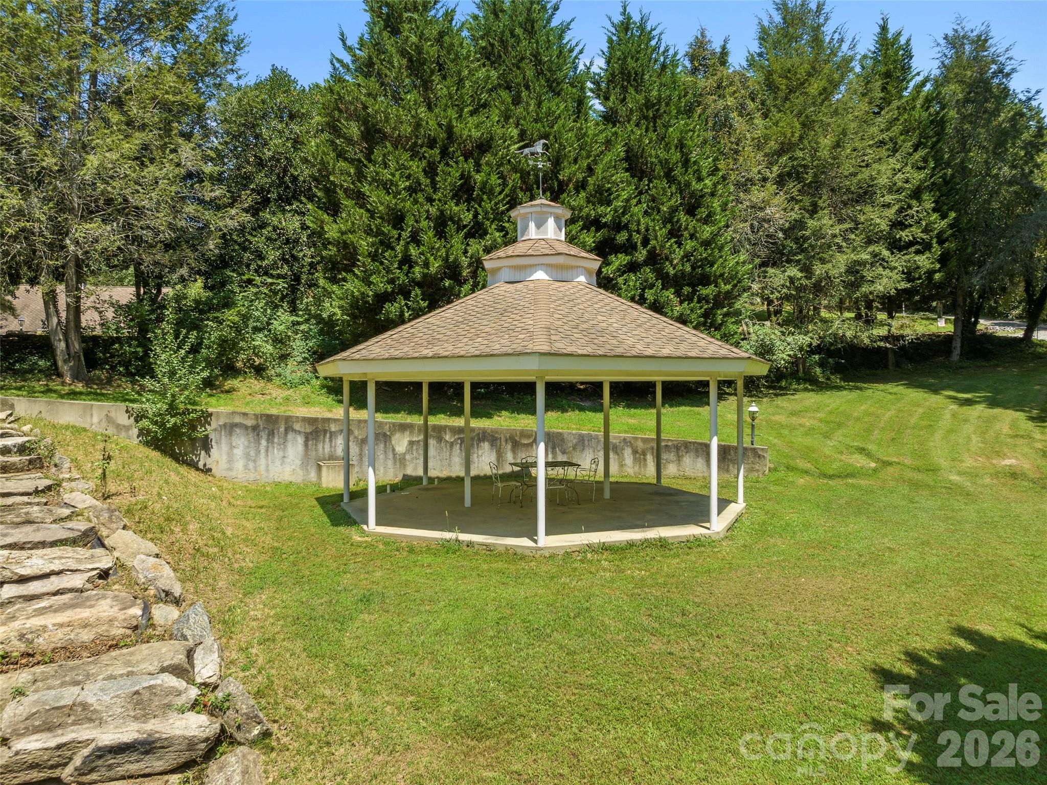 4901 Brevard Road Horse Shoe, NC 28742 - Photo 31 of 34 a front view of a house with a garden