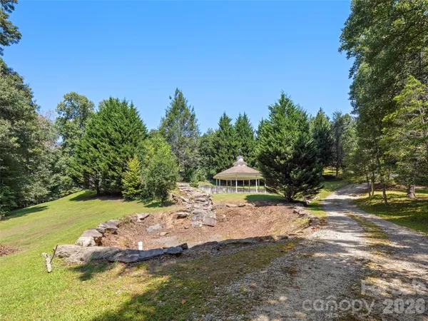 a view of a lake with a yard